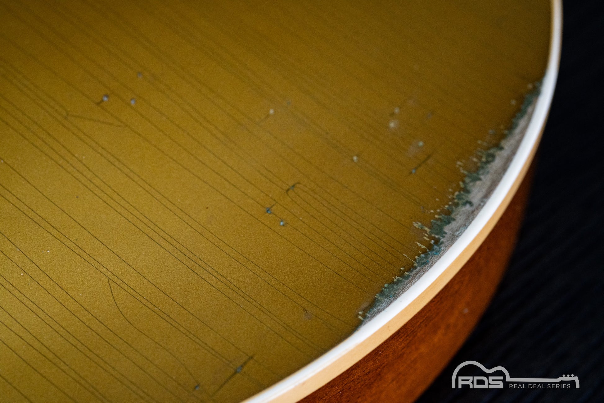 Close-up of a wooden surface with visible grain and texture
