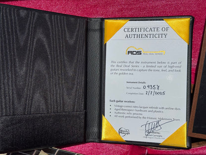 RDS Gibson Les Paul Electric guitar Certificate on a wooden bench with decorative metal backrest